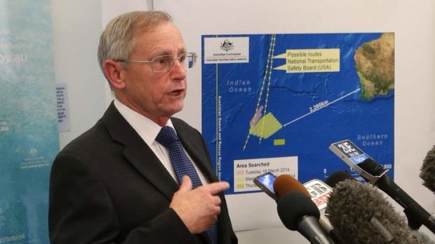 Debris found: Australian Maritime Safety Authority general manager John Young announcing details of what had been spotted.