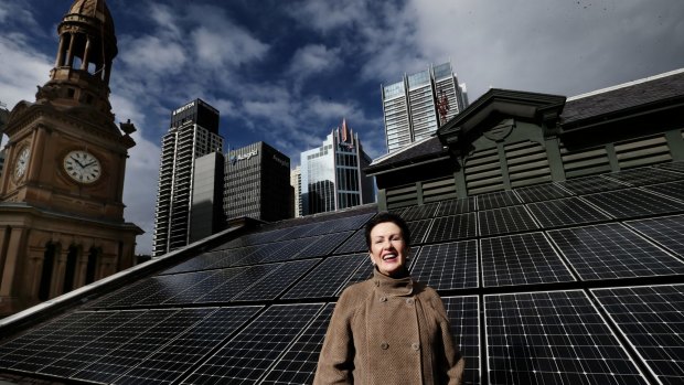 Clover Moore on the roof of Sydney Town Hall.