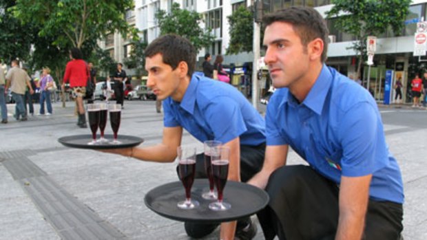Italian waiters Mirko Pagaelli (left) and Luca Romagnoli train for this weekend's race.