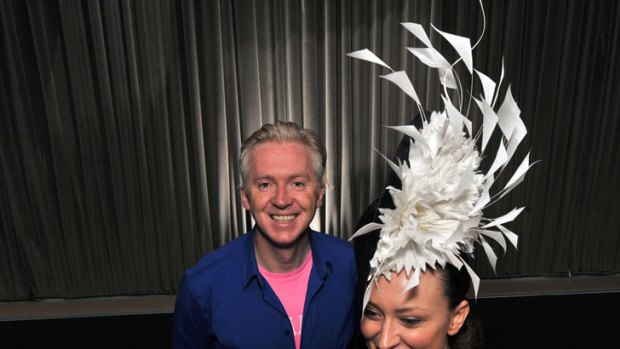 Philip Treacy with a model wearing one of his creations.