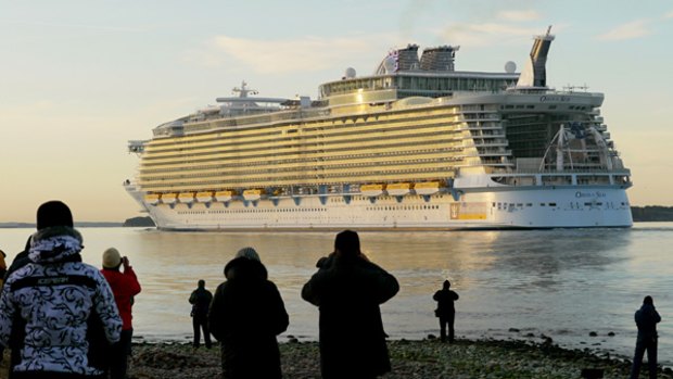 Royal Caribbean's Oasis of the Seas departing a ship yard in Finland. The Oasis of the Seas is the largest passenger vessel ever built and five times as large as the Titanic.