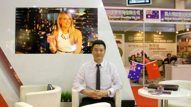 Money to be made in Australia: Wang Peng at a property expo in Beijing.