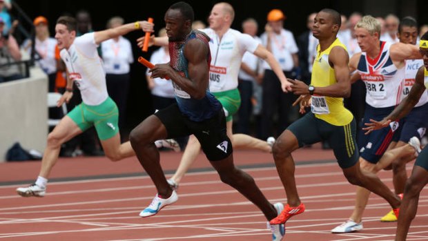 On track: Usain Bolt in the 4x100m relay at last year's Diamond League meeting in London.