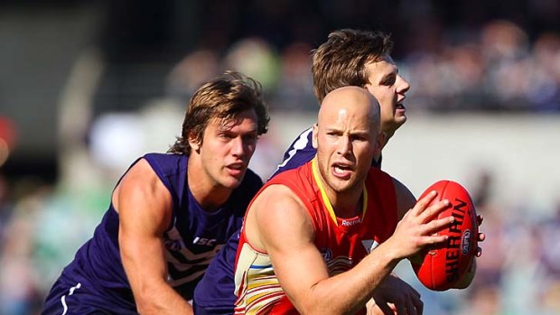 Left or right? Gary Ablett ponders his next move against Fremantle in round 15.