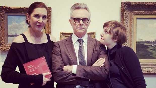 21st century anti-hero: Dunham with her artist parents, who have been targets for her satire.