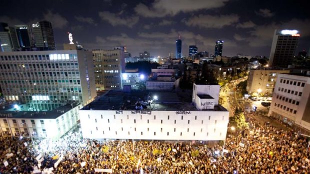 Critical mass ... thousands of people protest against the rising cost of living in Tel Aviv, Israel.