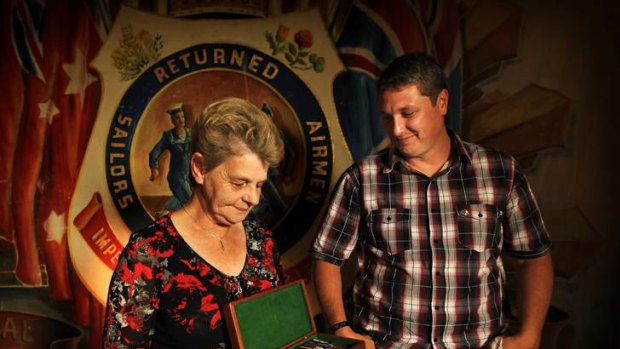 Brett Wood's mother Alison Jones and his lifelong friend Iain McLaren with the fallen Digger's medals.