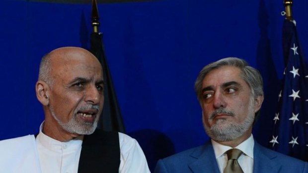 Afghan presidential candidates Ashraf Ghani (left) and Abdullah Abdullah.