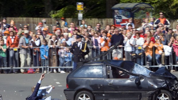 A car ploughs through spectators in Apeldoorn, Netherlands.