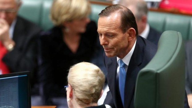 Prime Minister Tony Abbott in discussion with Speaker Bronwyn Bishop during question time.