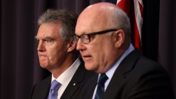 Duncan Lewis, the new director-general of ASIO, was introduced by Attorney-General George Brandis at Parliament House on September 22.