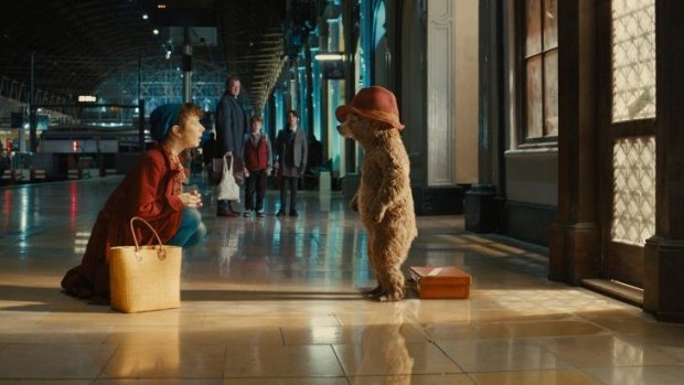 Mrs Brown (Sally Hawkins) finds a small bear from Darkest Peru at Paddington Station.