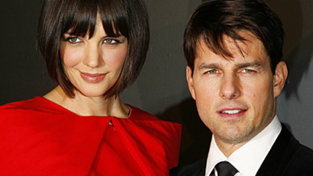Scaling the heights of Hollywood ... Katie Holmes towers over Tom Cruise.
