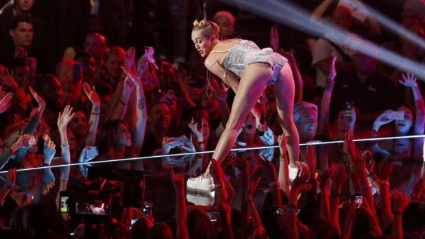 Twerking hard for a living: Miley Cyrus at the MTV Awards.