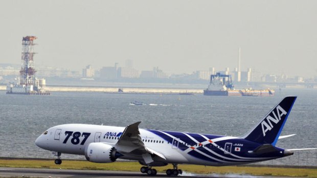 The first All Nippon Airways (ANA) Boeing 787 Dreamliner arrives at Tokyo's Haneda airport.