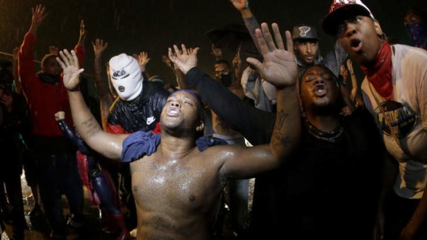 The crowd defies a curfew in Ferguson on August 17. Tear gas was fired to disperse them after this picture was taken.