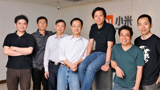 Lei Jun, founder, chairman and chief executive of Xiaomi (seated) with his six co-founders.