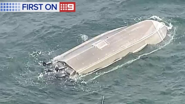 The boat which capsized in Moreton Bay, stranding six people.