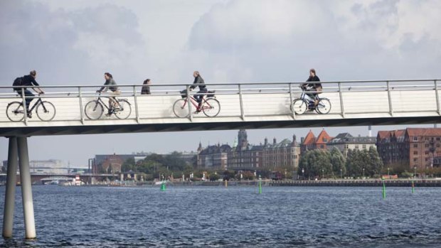 Ride time ... cyclists fill the broad bike lanes all over Copenhagen.