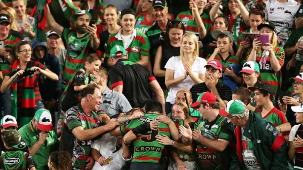 Issac Luke receives the plaudits from the South Sydney fans after the grand final win.