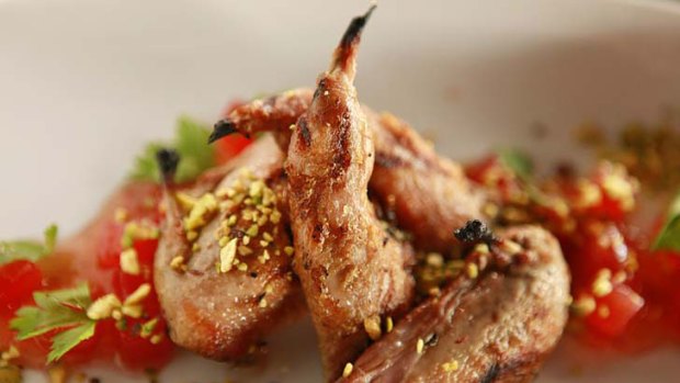 A must-try dish ... Chargrilled quail with watermelon.