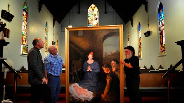 Stephen Holmes, Peter Cook and Artist Walter Magilton with the painting in Christ Church.