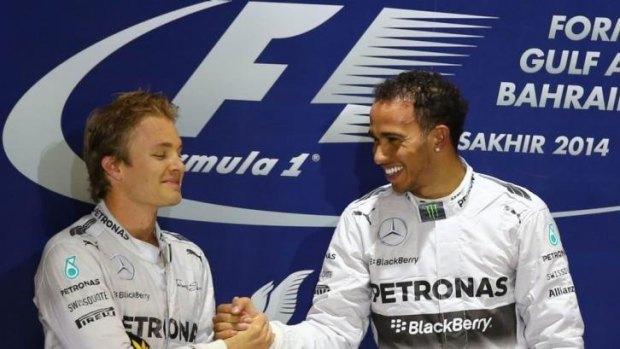 Mercedes driver Lewis Hamilton celebrates on the podium with his teammate Nico Rosberg after winning the Formula One Bahrain Grand Prix at the Sakhir circuit earlier this month. Hamilton won the race ahead of his Mercedes teammate after a thrilling wheel-to-wheel duel.
