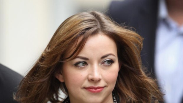 Singer Charlotte Church arrives at the Royal Courts of Justice before she and her parents were awarded damages and costs of $900,000 from the News of the World.