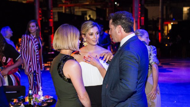 Jasmine Yarbrough shows off her engagement ring to Harper's Bazaar Australia editor Kellie Hush alongside Karl Stefanovic at the David Jones autumn winter collections launch on Wednesday.
