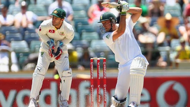 Happy hunting ground ... A.B. de Villiers sends another delivery hurtling towards the boundary during his dashing knock of 169 in Perth on Sunday.