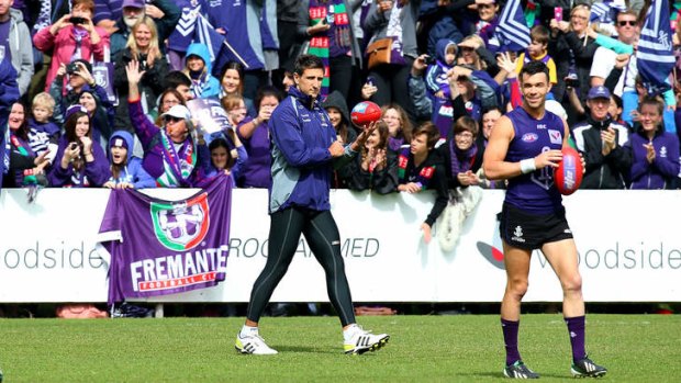Purple haze: Matthew Pavlich and Ryan Crowley at Fremantle's open training session yesterday.