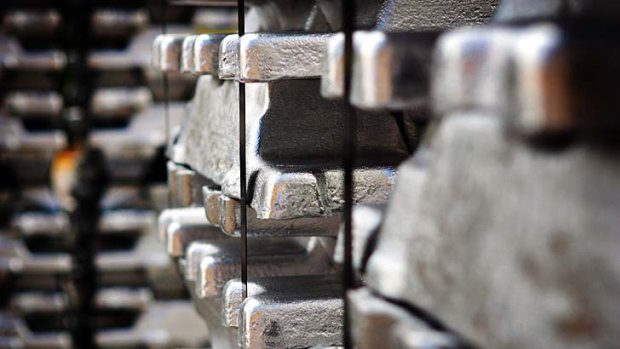 BHP Billiton's aluminium projects are not immune from drops in the metal's price.