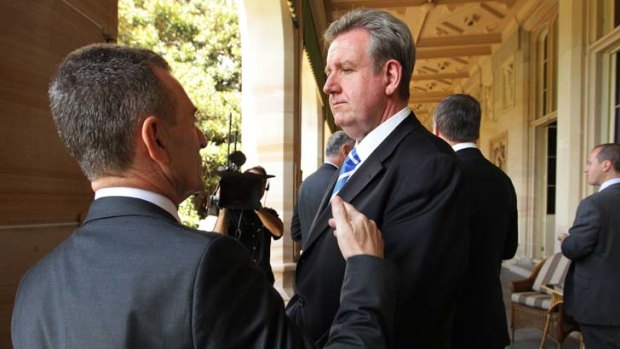 Public war ... Barry O'Farrell with his communications director, Peter Grimshaw who the Premier stood down over an email unrelated to the casino.