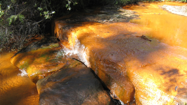 When the stream returns, it has heavy iron contamination.
