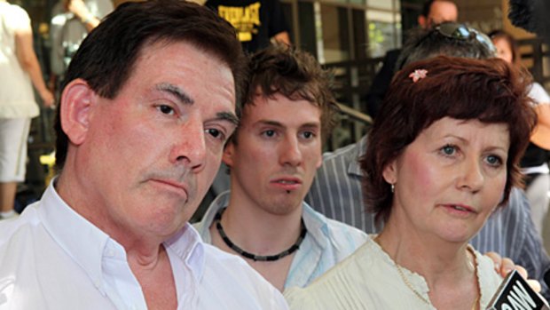 The parents of Brodie Panlock, Damien (left) and Rae Pancock and their son Cameron (centre), speak to reporters as they leave the Melbourne Magistrate court. The parents of Ms. Panlock, who killed herself after being subjected to relentless workplace bullying, says the law should be changed to allow courts to jail tormentors.