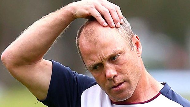 Scratching his head:  Geoff Toovey.
