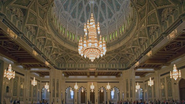 Tourists at the Sultan Qaboos Grand Mosque.