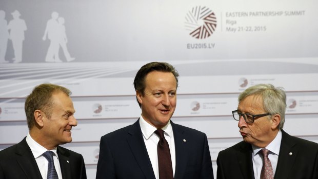 Happier times: British Prime Minister David Cameron flanked by Mr Tusk (left) and Mr Juncker in Latvia last year. Mr Cameron's behaviour has left Mr Juncker angry and bitter.