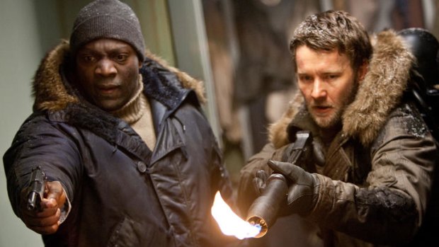 No, you go first ... Adewale Akinnuoye-Agbaje and Joel Edgerton have a serious pest problem.