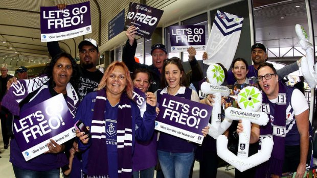 Fans show their support before the Dockers arrive to fly to Melbourne
