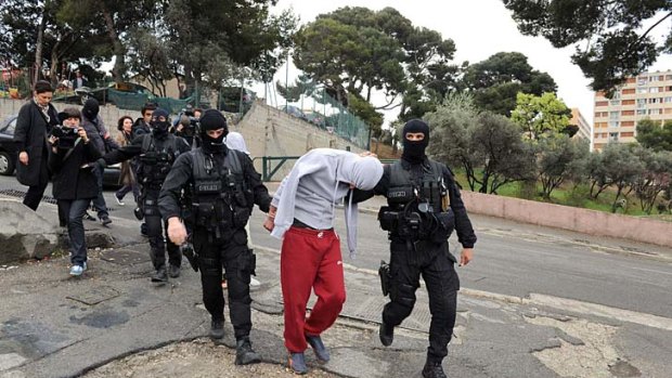 Police make an arrest in Marseille.