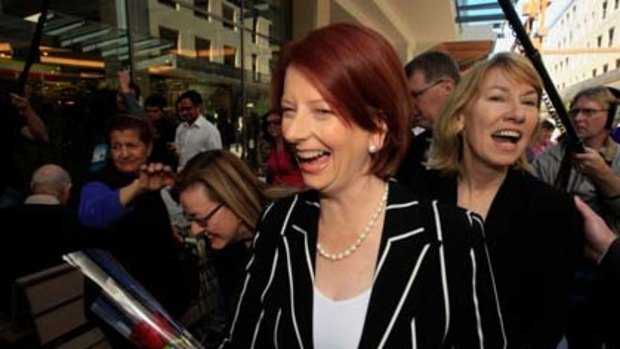 Julia Gillard's mood lifted when she visited the Top Ryde City shopping centre in Sydney with local member Maxine McKew.
