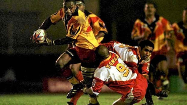 Papua New Guinea take on Tonga at the 2000 tournament.
