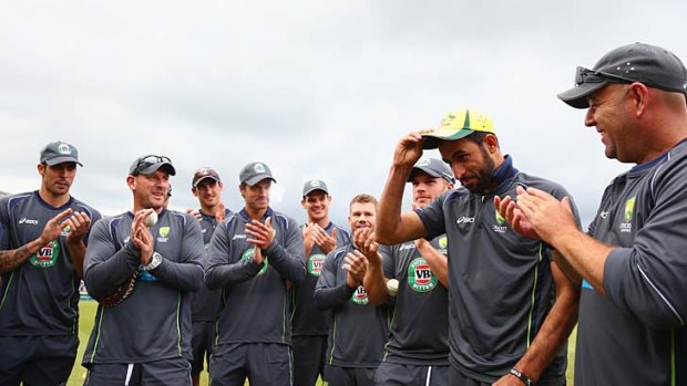 Fawad Ahmed is awarded his first cap by George Bailey before the T20 match between England and Australia last month.