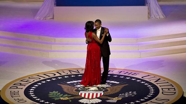 President Barack Obama and first lady Michelle Obama take the first dance during the inaugural ball.