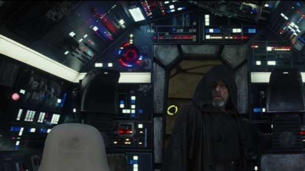 Luke Skywalker (Mark Hamill) enters the cockpit of the Millennium Falcon in Star Wars: The Last Jedi