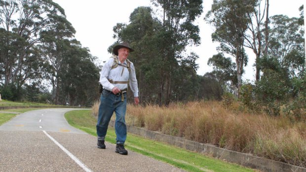 Malcolm Brown hits the road in preparation for his walk to Dubbo.
