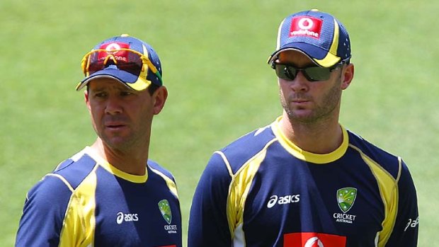 Ricky Ponting and Michael Clarke during a training session at the Gabba yesterday.