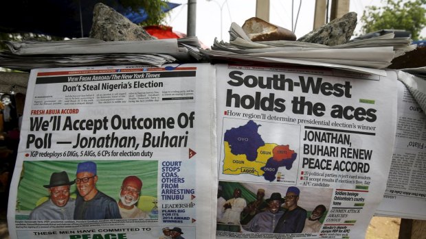 Newspapers featuring election coverage are sold at a vendor's stand in Katsina city.
