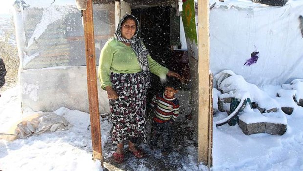 Syrian refugees outside a makeshift home in Ankara.